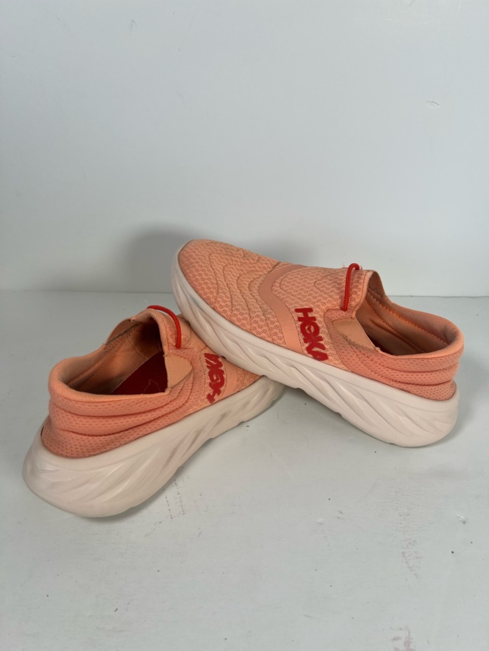 Hoka Peach Salmon Slip-On Sneakers with White Soles